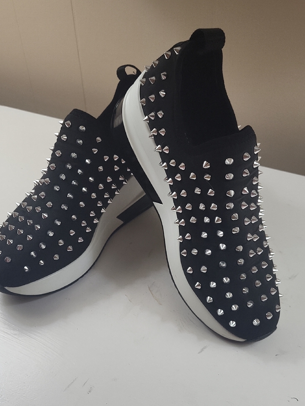 Gianni Bini Black Studded Slip-On Sneakers